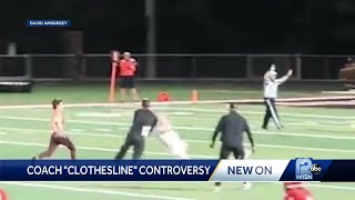 Video: Coach tackles student who ran on football field