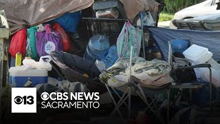 What's the process behind removing homeless camps in Sacramento?