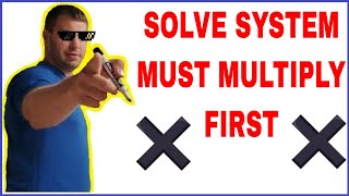 Solving Systems by Elimination Multiply First