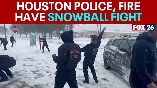 Houston police and firefighters have a snowball fight