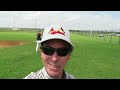 When You're THE Sports Travel GOAT, You Get Access - and a Free Hat! On Field Post-Game Coach/Player