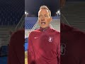 stanford men s head coach jeremy gunn shares some words post match after beating ucsb 2 1 shorts