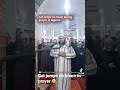 Cat jumps on Imam in Algeria Jummah Prayer .