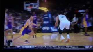 Stephen Curry crosses over Steve Nash