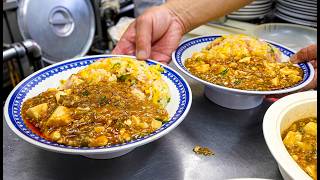 Fried rice with hot bean paste prepared by a skilled pot-bellied master in Hiroshima.