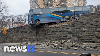 Crews move MTA bus dangling over Bronx overpass | News 12