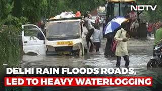 Delhi Rain Floods Roads, People Forced To Abandon Vehicles To Get To Work