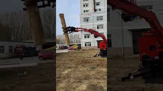 Four-wheeled excavator, rotating wood grabber, tipping dump truck, one machine with multiple use