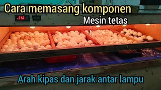 Memasang /merangkai komponen mesin tetas dan pemasangan kipas angin