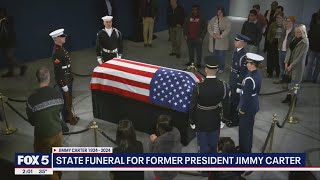 Jimmy Carter's casket arrives in DC