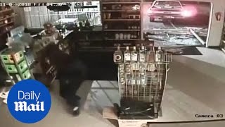 Thieves use truck to pull liquor store doors and rob it