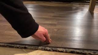 Installing vinyl plank flooring over carpet padding