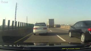 Car hits Construction sign on Highway