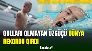 Qolları olmayan çinli üzgüçü yeni dünya rekordu müəyyənləşdirib