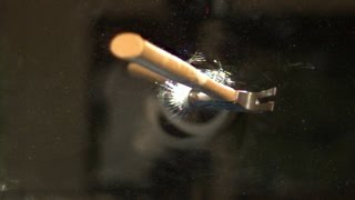 Watch This Glass Ripple In Slow Motion Before It's Totally Smashed