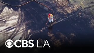 East Los Angeles ruptured pipeline sends thousands of gallons of oil into streets, LA River