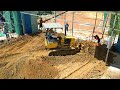 Good Operation Komatsu Dozer Push Dirt Land Filling Up In The Gap 5Ton Trucks Unload Soil