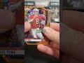 ripping a pack a day until we find a 1 of 1 sportscards panini nfl football shorts