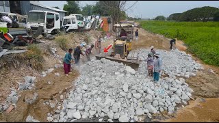 Wonderful activity Rock and sand into water by power bulldozer komatsu