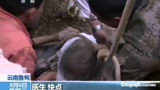 China quake: elderly woman pulled from rubble after three days