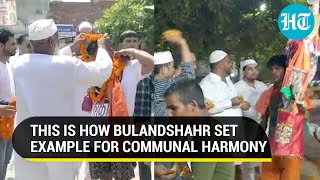 UP: Muslims welcome kanwariyas with garlands \u0026 flower shower; Mega Tiranga yatra in Bulandshahr