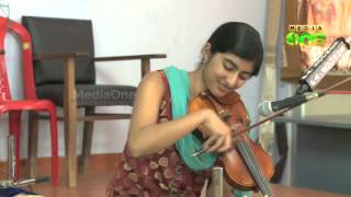 Aiswarya plays violin for psychiatric patients