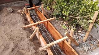 Veterans concrete,...concrete grade beam forms / rebar @ new automatic gate