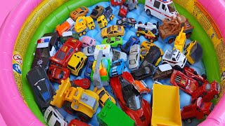 Toy Cars Dive Off Silvery Road Into Toy Pool