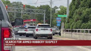 Officers search for suspect in armed robbery in Greenville