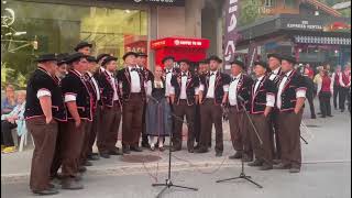 Yodelers singing in Grindelwald Switzerland, foot of Swiss Alps