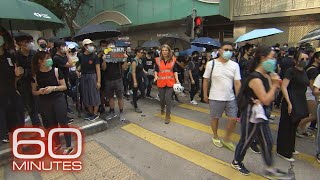 Hong Kong protests: Weekend clashes, weekday capitalism