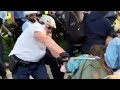 Cop Charged with Beating Student Protester Turns Himself In