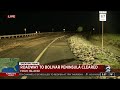 Crews arrive to clear rocks from impassable roadway by High Island near Bolivar Peninsula