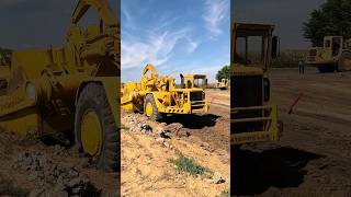 CAT 631B assisted by a D9 loading up.  #caterpillar #construction #bulldozer #komatsu