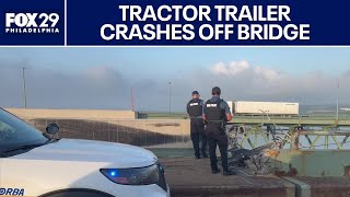 Tractor trailer cab careens off Delaware Memorial Bridge, falls into river below