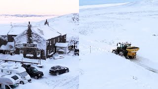 Farmer with snowplough rescues guests trapped in Britain’s highest pub | SWNS