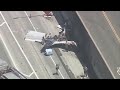 Plane makes crash landing on 91 Freeway in California