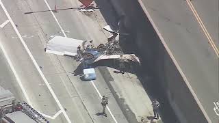 Plane makes crash landing on 91 Freeway in California