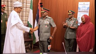 Watch What Happen When Buhari Decorates Newly Promoted Commander, Brigade Of Guards