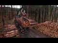 kesla 2124z crane loading timber logs into truck by hts holztransporte germany