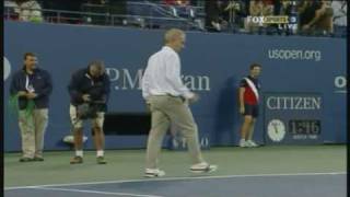 Novak Djokovic and John McEnroe having a hit