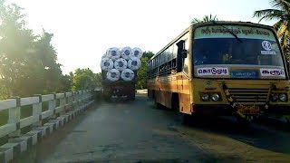 Car Traveling Load Lorry And Bus Car Crossing Kodumudi Road TN