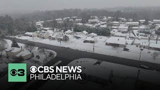 Residents, crews in Delaware County, Pennsylvania, clean up snow as winter weather continues