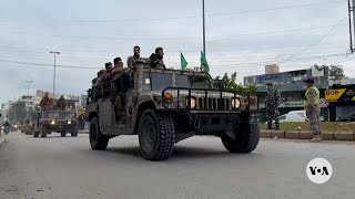 Lebanese army convoys seen heading toward Israeli-Lebanese border as part of cease-fire deal