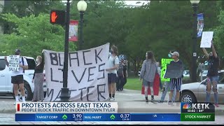Protestors briefly block traffic in downtown Tyler