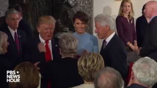 President Donald Trump enters Statuary Hall luncheon