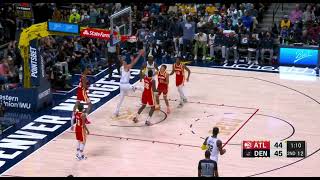 Nikola Jokic battling for rebound vs. Hawks