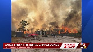 Large brush fire burns campgrounds in Osceola County, officials say