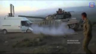 Russian T-72 drives over civilian minibus