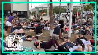 Protesters lay outside of the St. Petersburg Police Department in response to George Floyd death